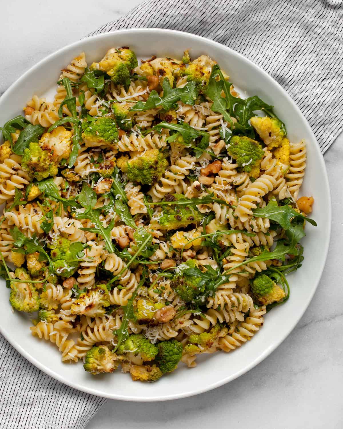 Romanesco arugula pasta on a plate.