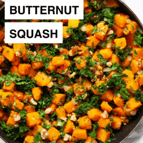 Sautéed butternut squash and kale in a skillet.