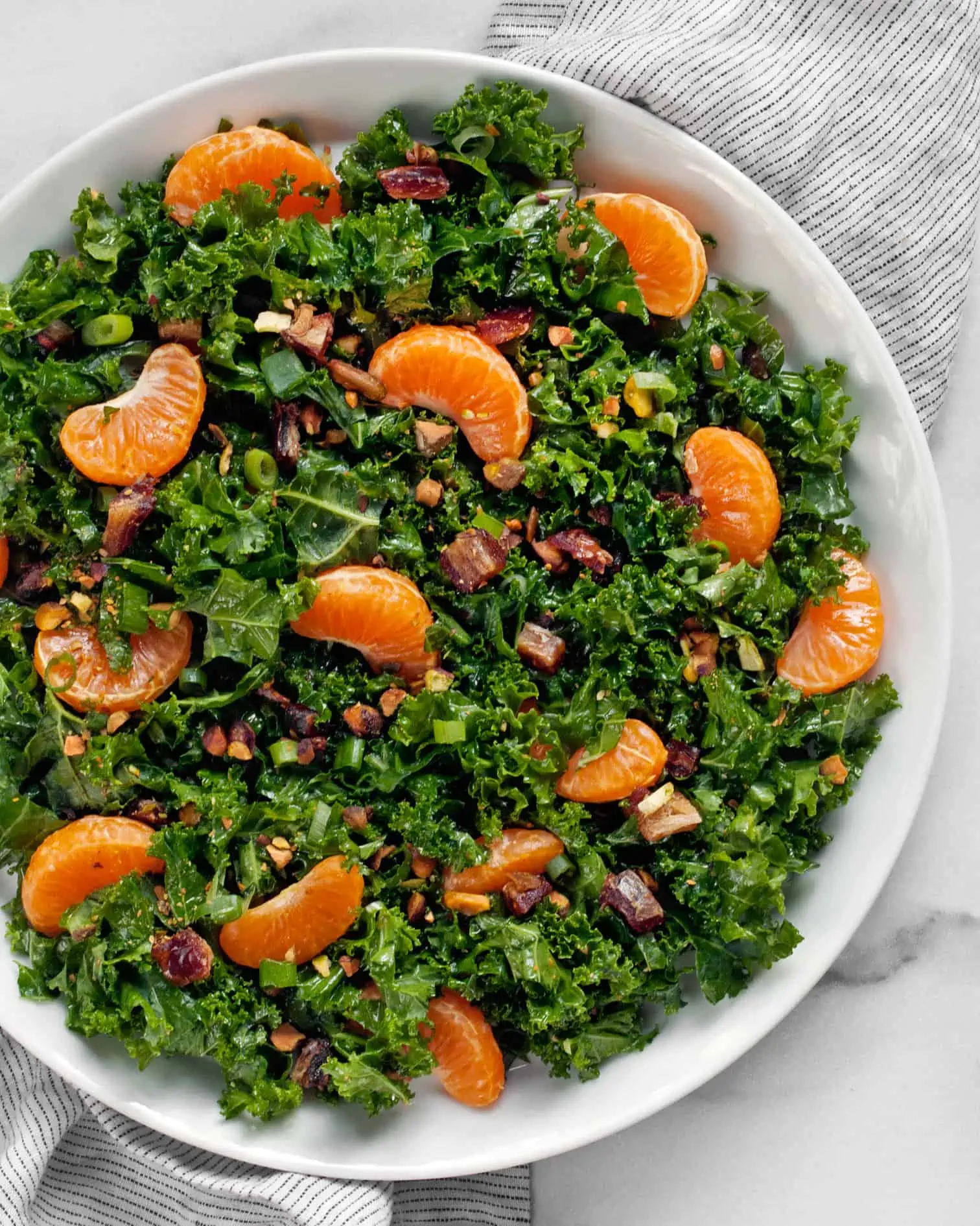 Mandarin orange kale salad on a plate