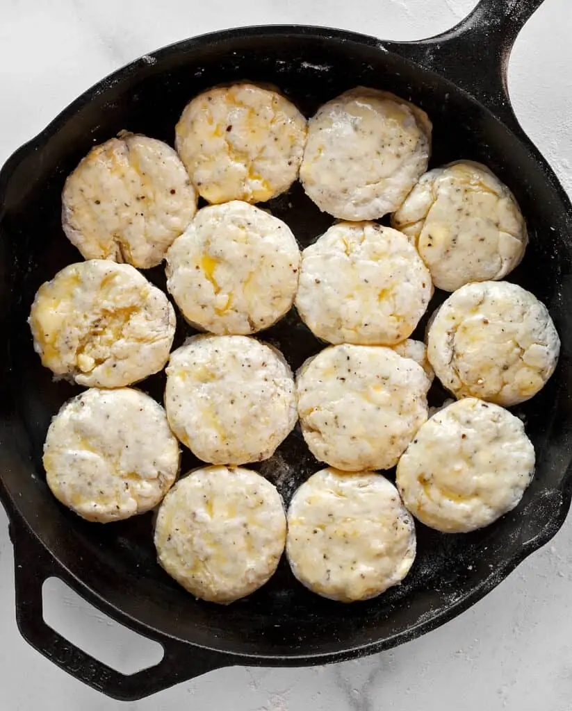 Brush the biscuits with melted butter
