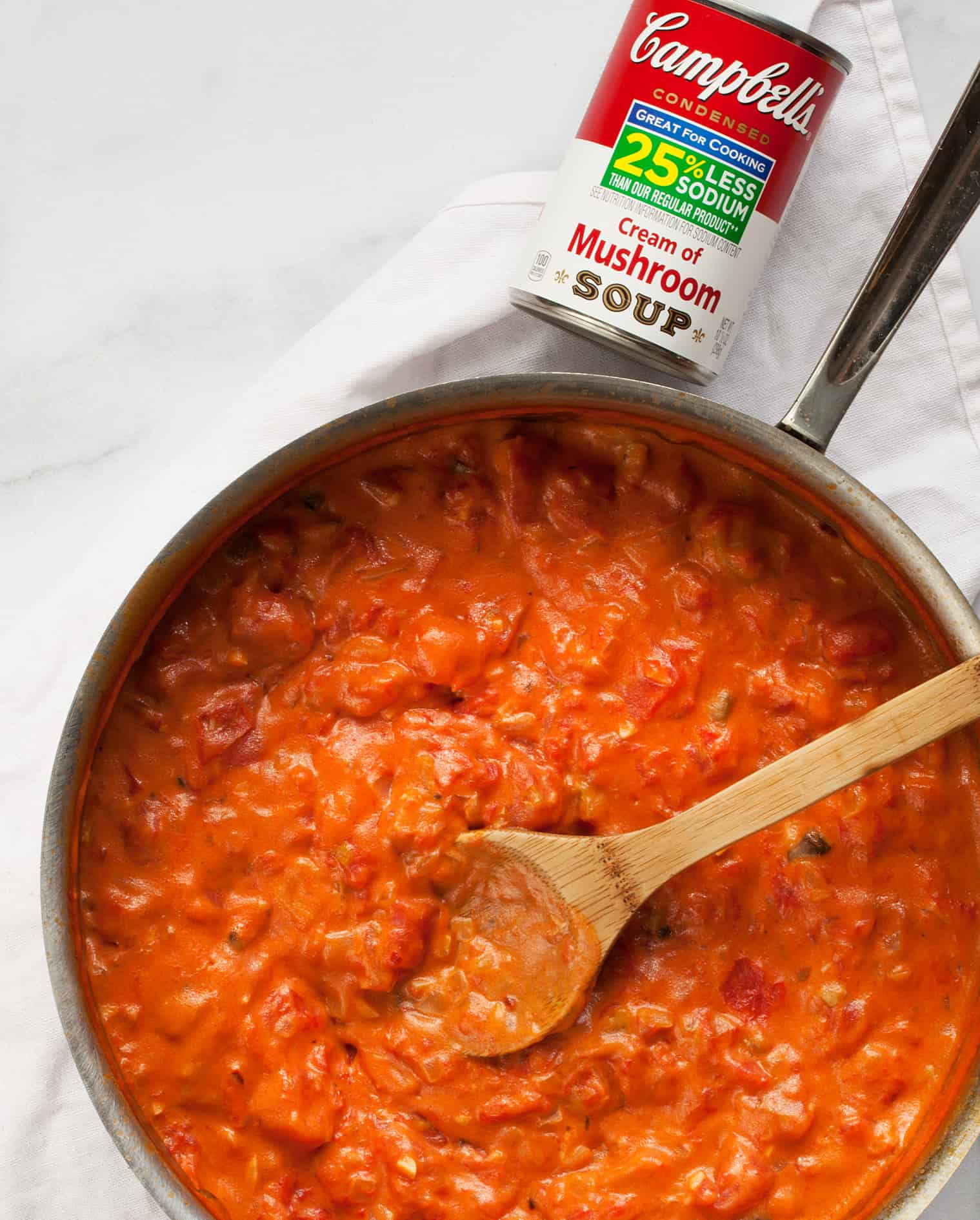 Creamy tomato mushroom sauce in a skillet