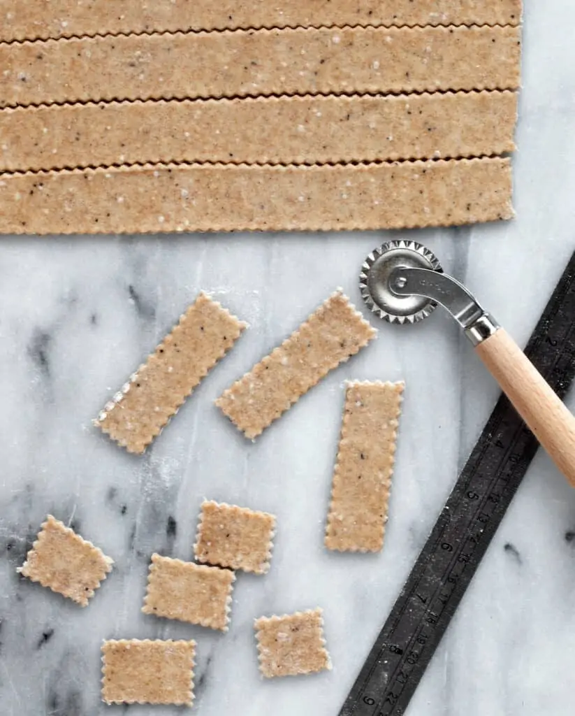 Roll out the dough to cut the crackers