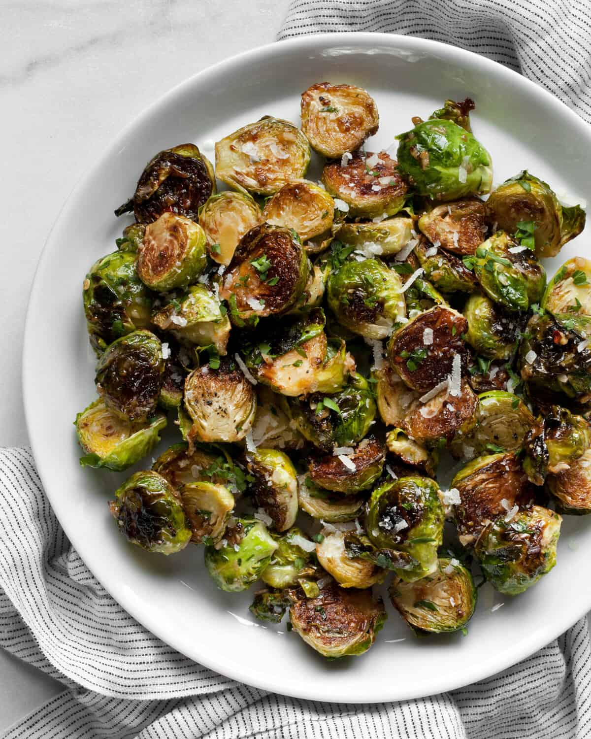 Caramelized brussels sprouts on a plate.