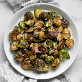 Sauteed brussels sprouts on a plate.