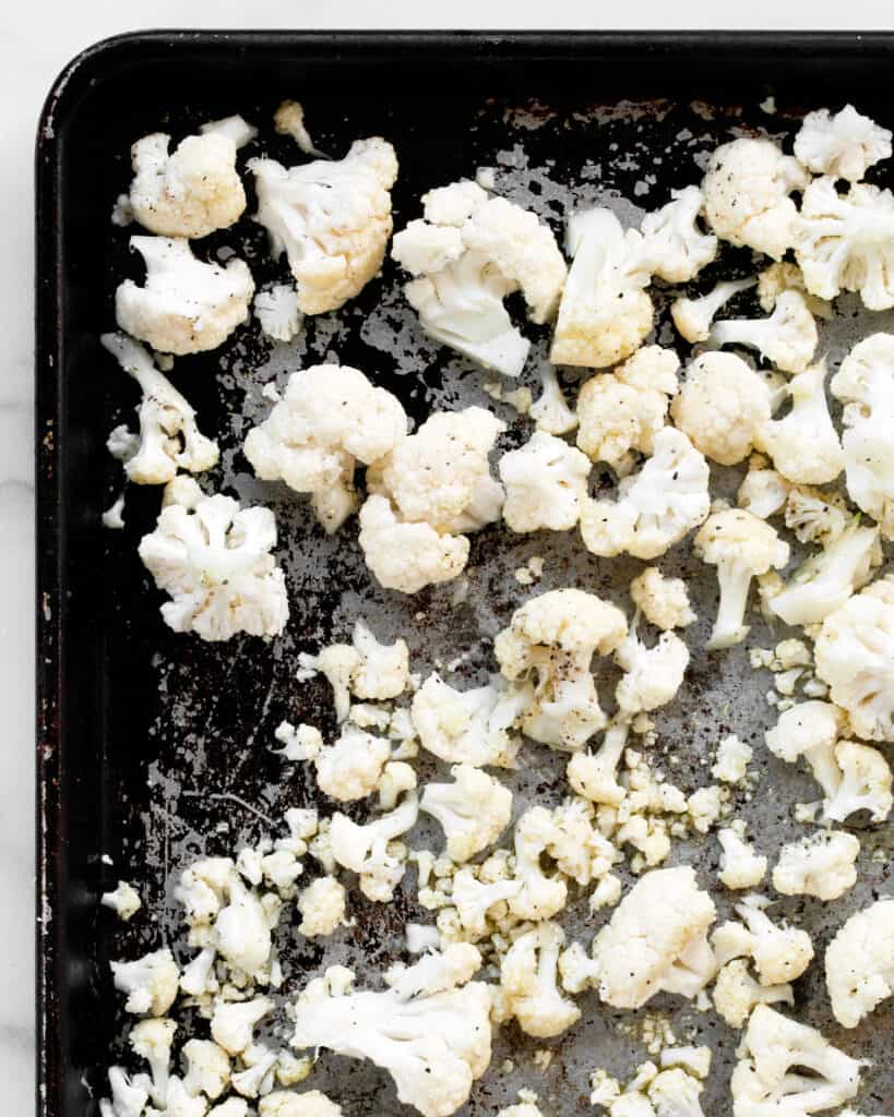 Cauliflower florets on a sheet pan