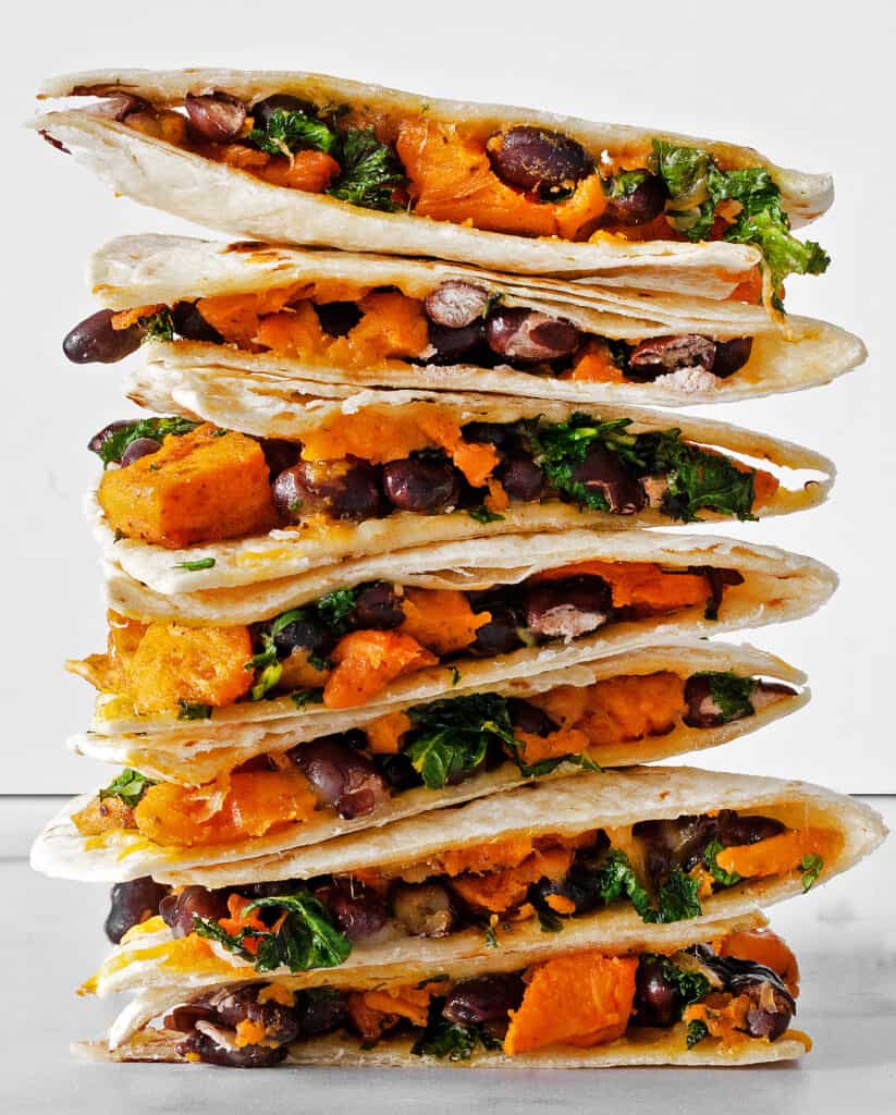 Cut sweet potato black bean quesadillas in a stack