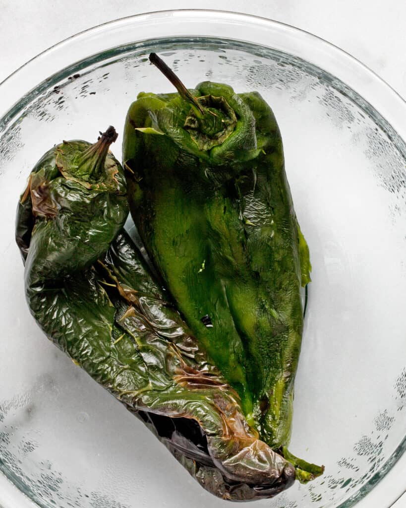 Roasted poblano peppers in a bowl