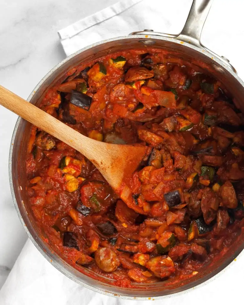 Stir the roasted vegetables into the tomato stew