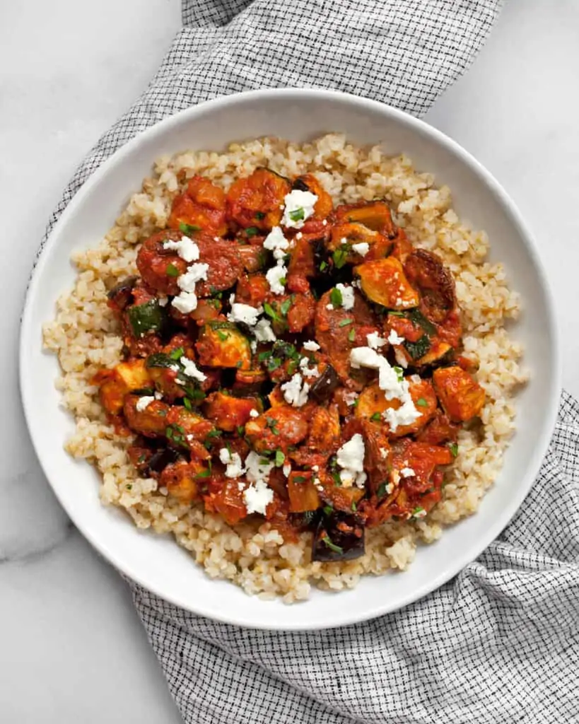 Roasted Eggplant Zucchini Tomato Stew served with couscous