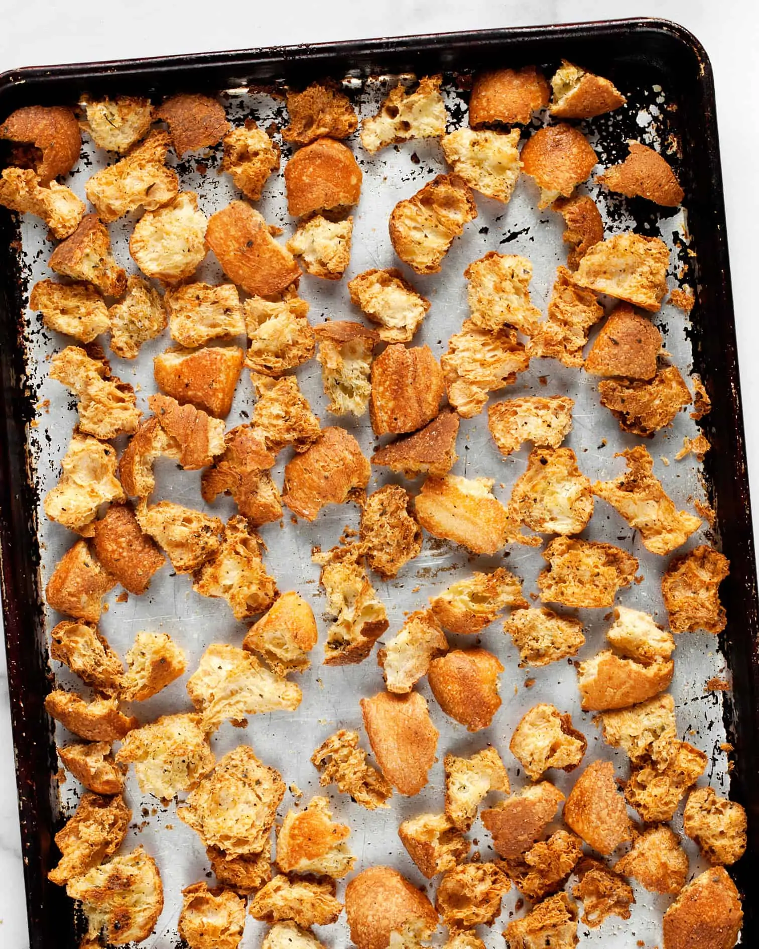 Homemade croutons on a sheet pan