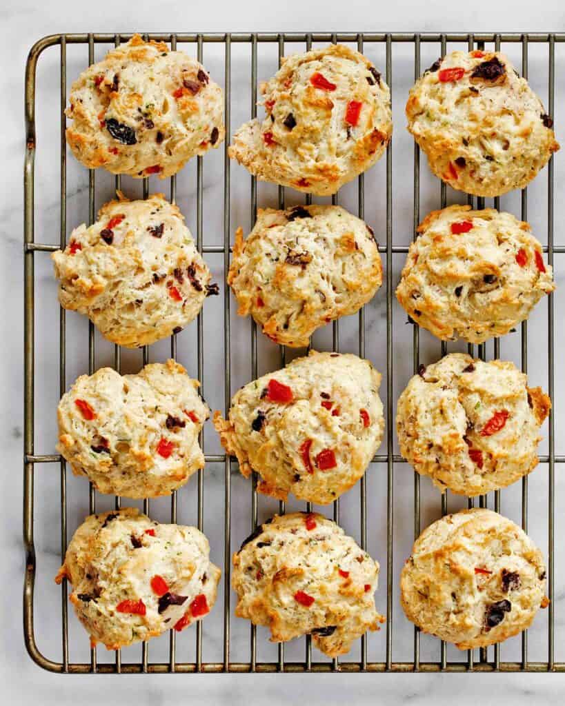 Red pepper biscuits on a wire rack