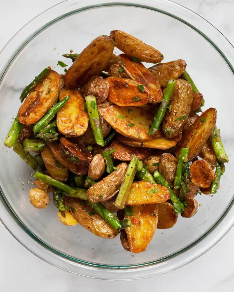 Stir the vinaigrette into the roasted potatoes and asparagus