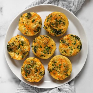 Broccoli cheddar frittatas on a plate.