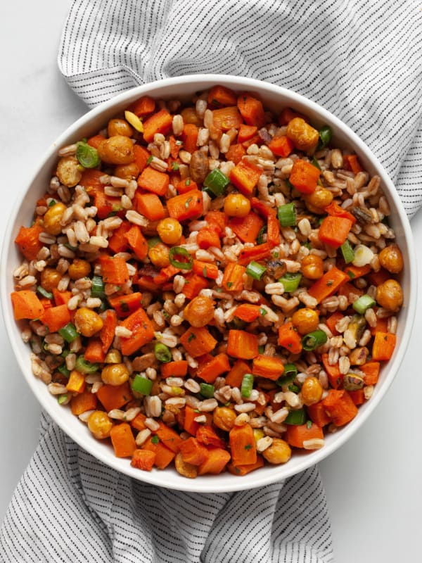 Farro with roasted carrots and chickpeas in a bowl.