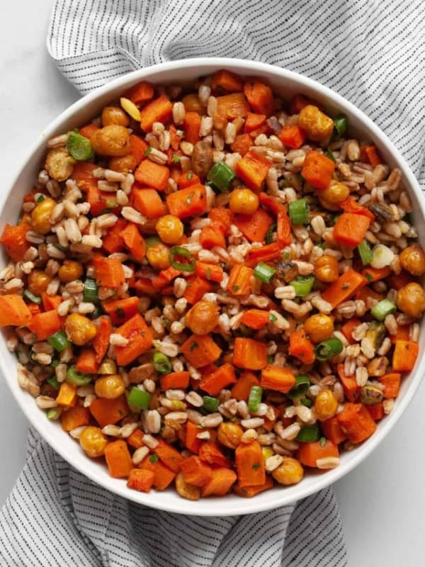 Farro with roasted carrots and chickpeas in a bowl.