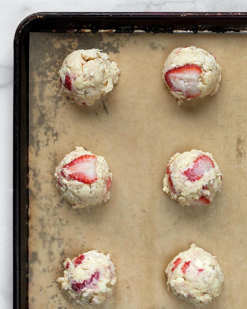 Portioning out scone dough on a baking sheet