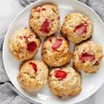 Strawberry almond scones on a plate.