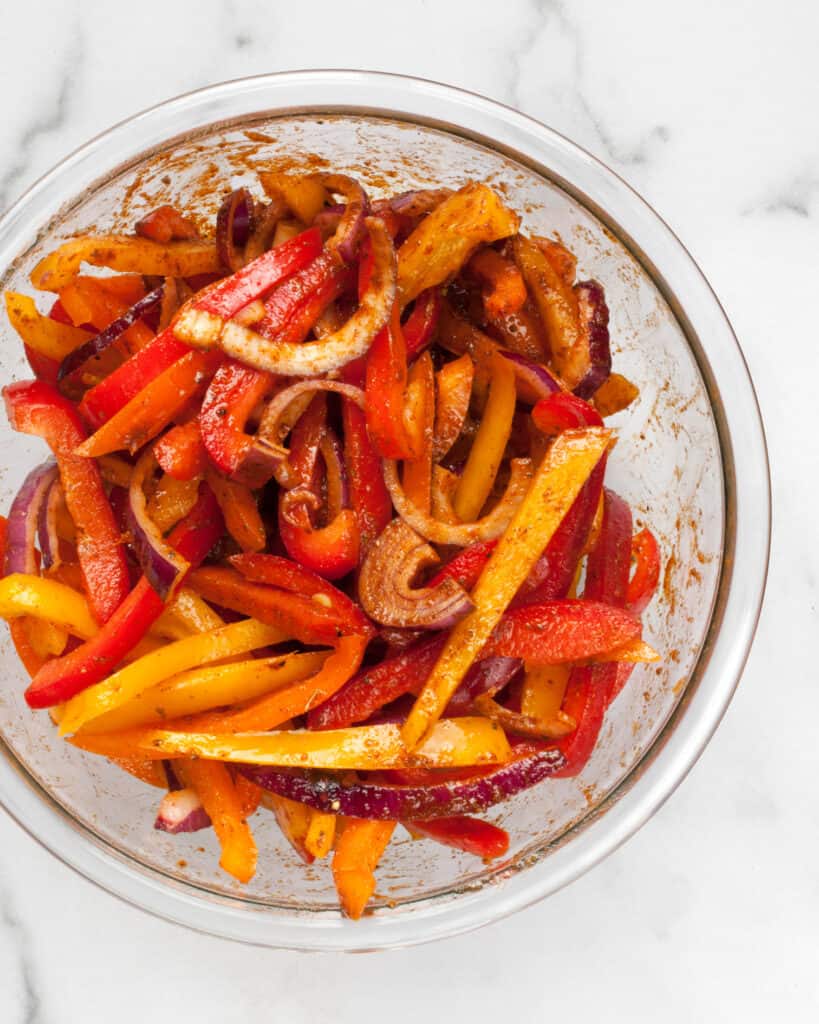 Marinated peppers and onions in a bowl