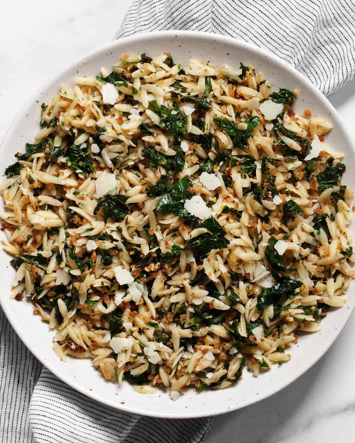 Lemon kale orzo on a plate.