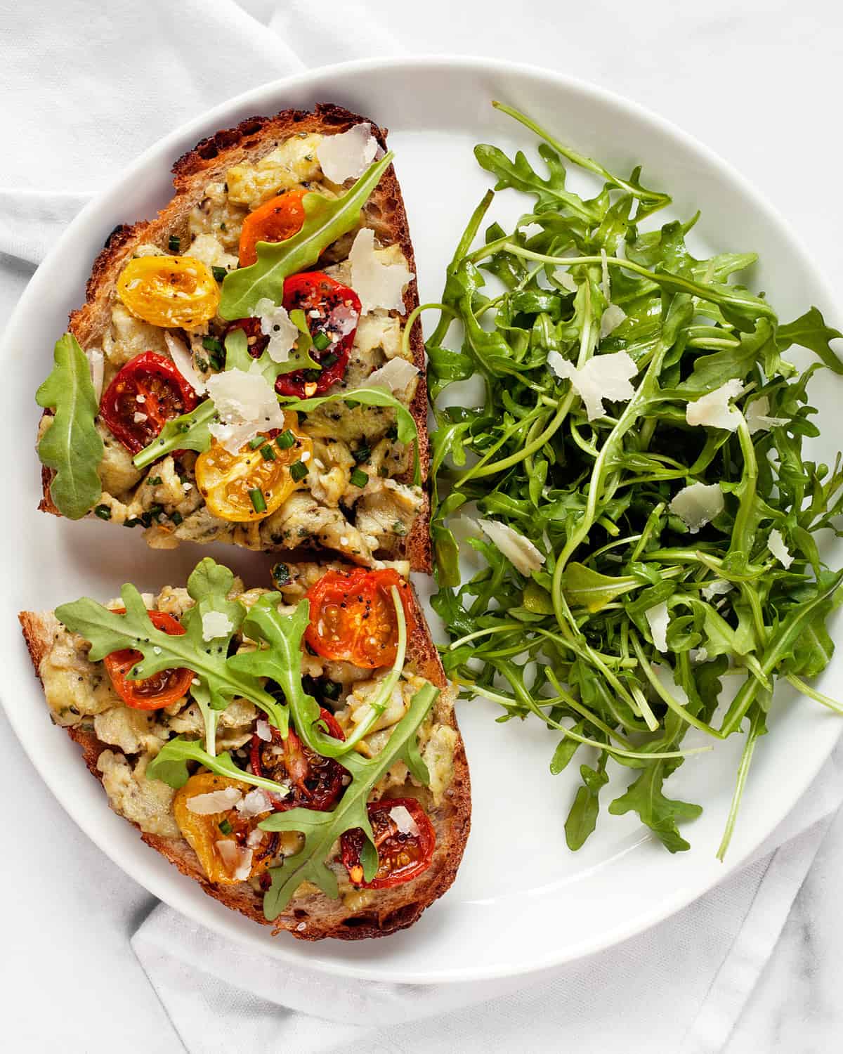 Pesto Eggs with Roasted Tomatoes with a salad