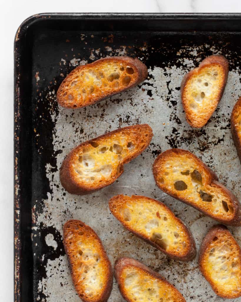 Toasted bread on a sheet pan