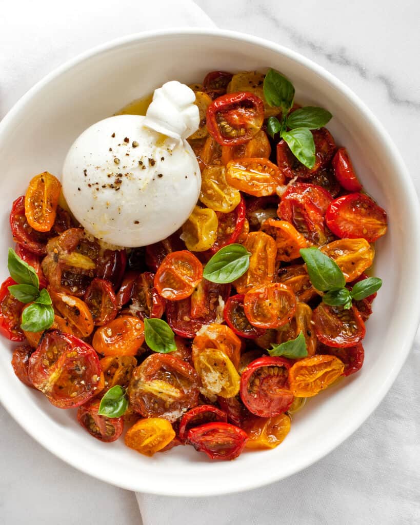 Burrata Cheese and Roasted Tomatoes in a bowl