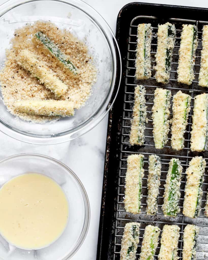 Dipping the zucchini fries into panko