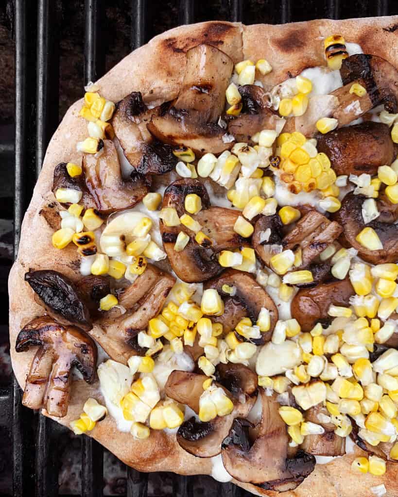 Mushroom pizza on the grill