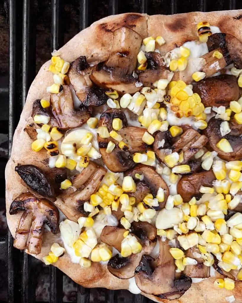 Mushroom pizza on the grill