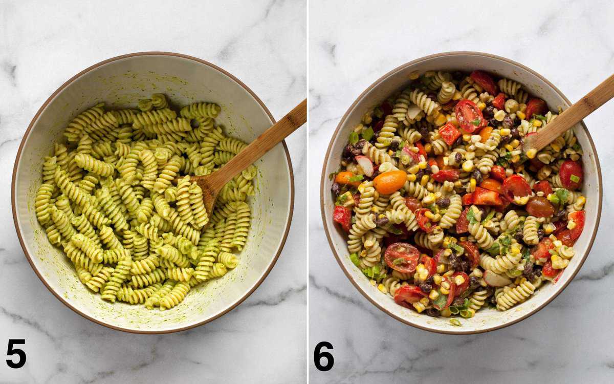 Dressings stirred into pasta. All pasta salad ingredients mixed together in a bowl.