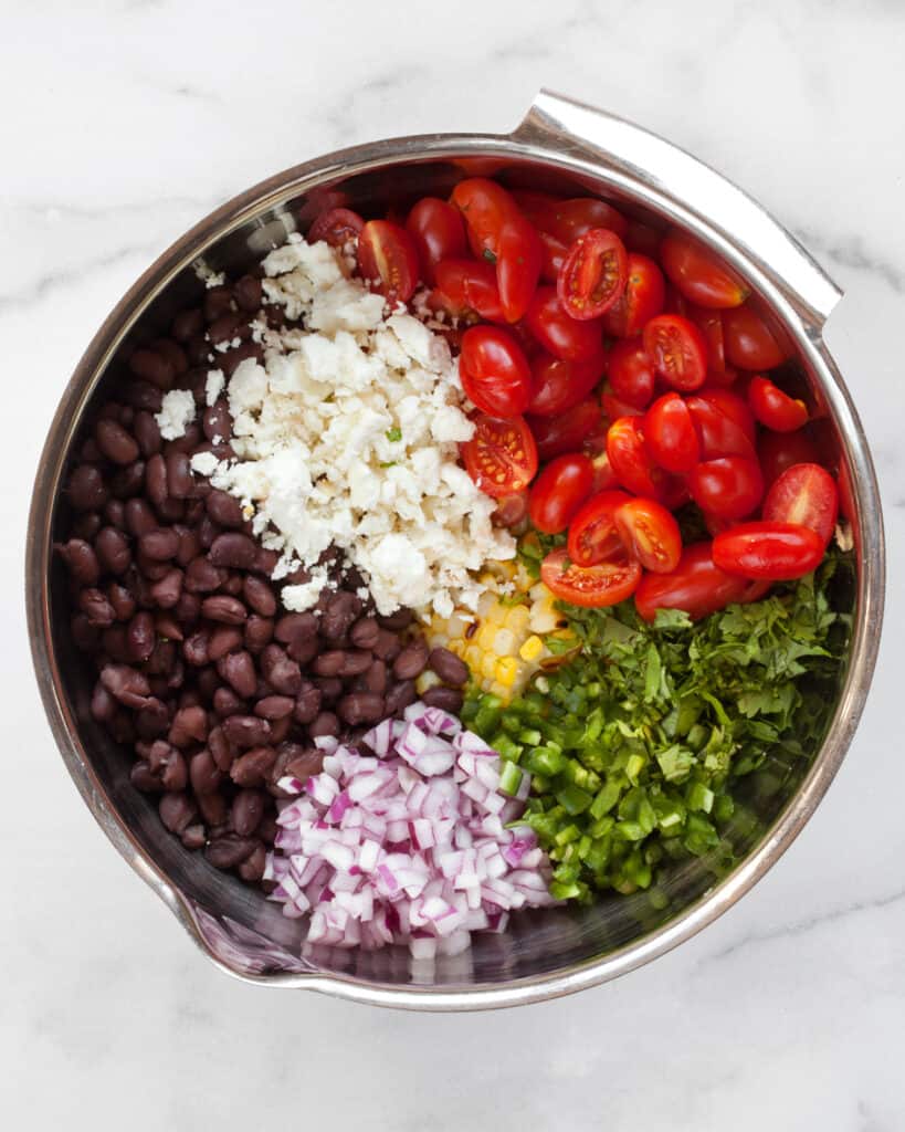 Corn black bean salad ingredients in a bowl