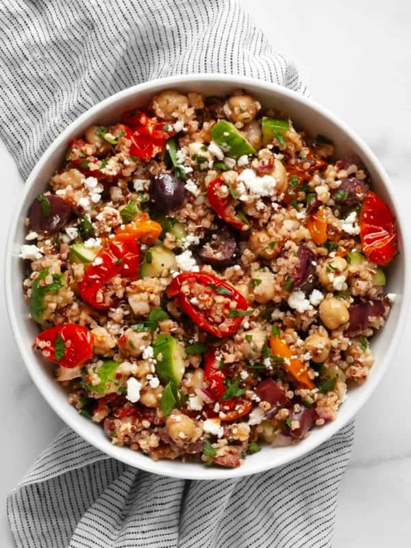 Quinoa chickpea salad in a small bowl.