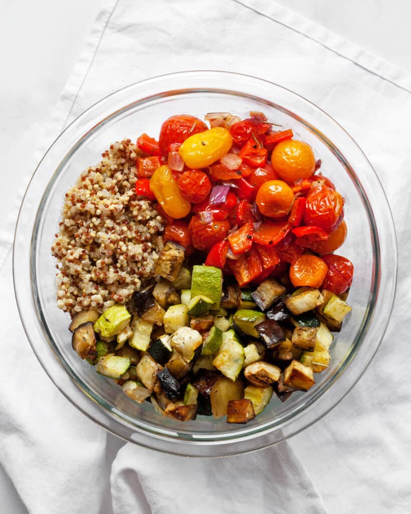 Stir together the vegetables and quinoa