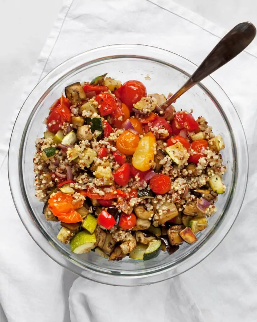 Stir together the vegetables and quinoa
