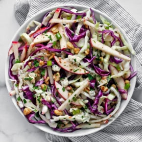 Apple cabbage salad in a bowl.