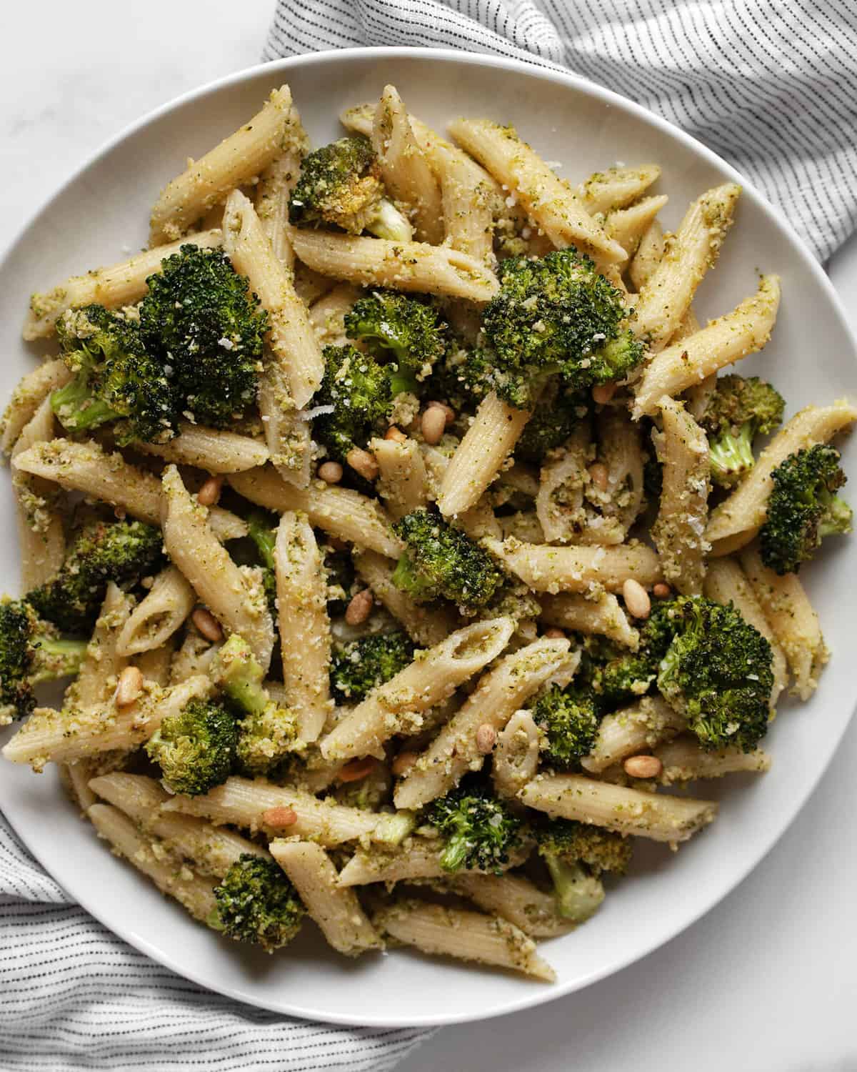 Roasted broccoli pasta on a plate.
