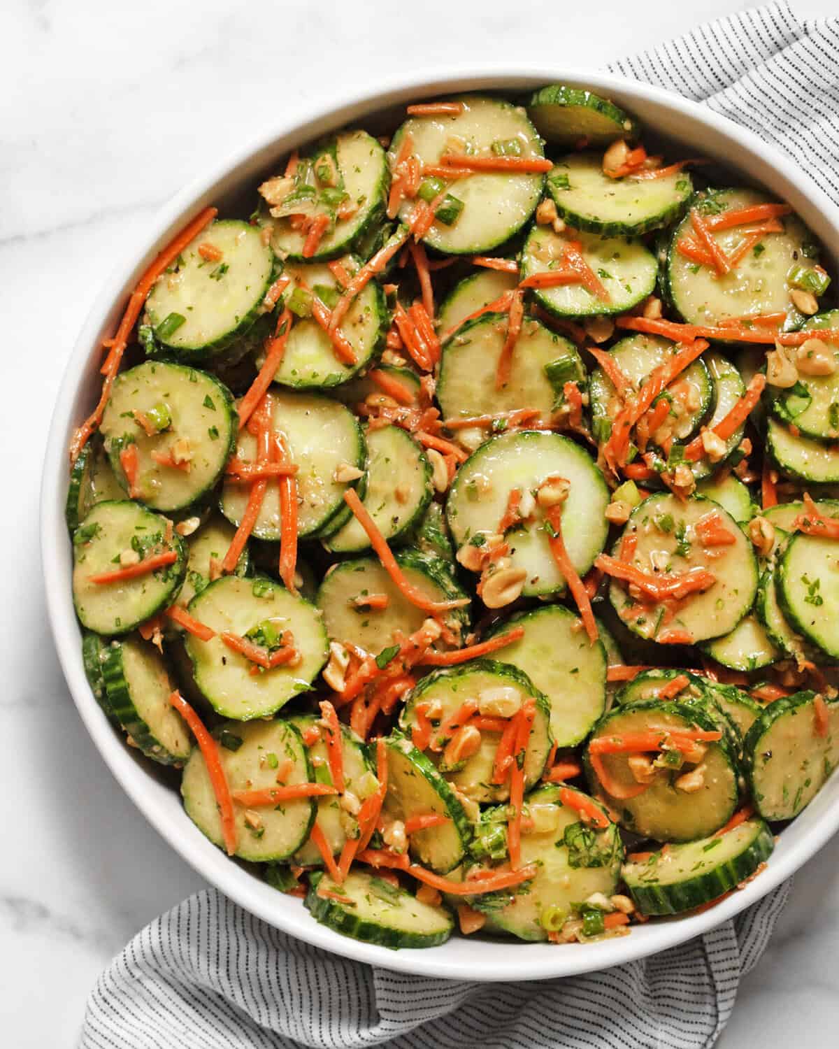 Cucumber carrot salad in a bowl.