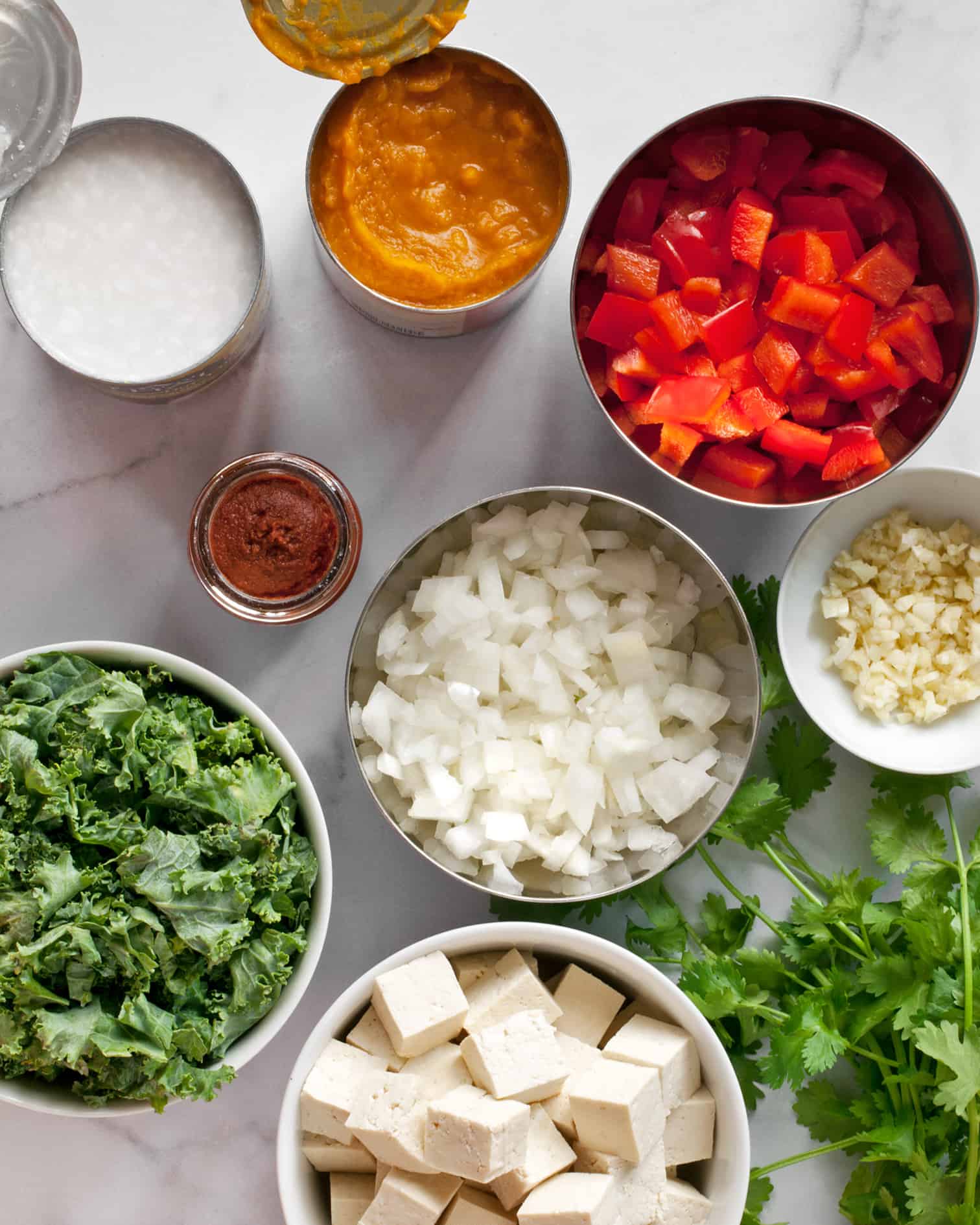 Ingredients for vegan tofu curry with pumpkin