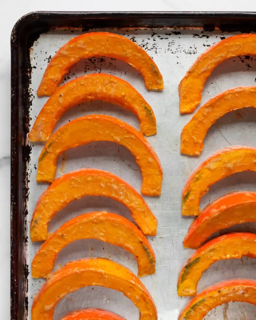 Put squash wedges on sheet pan