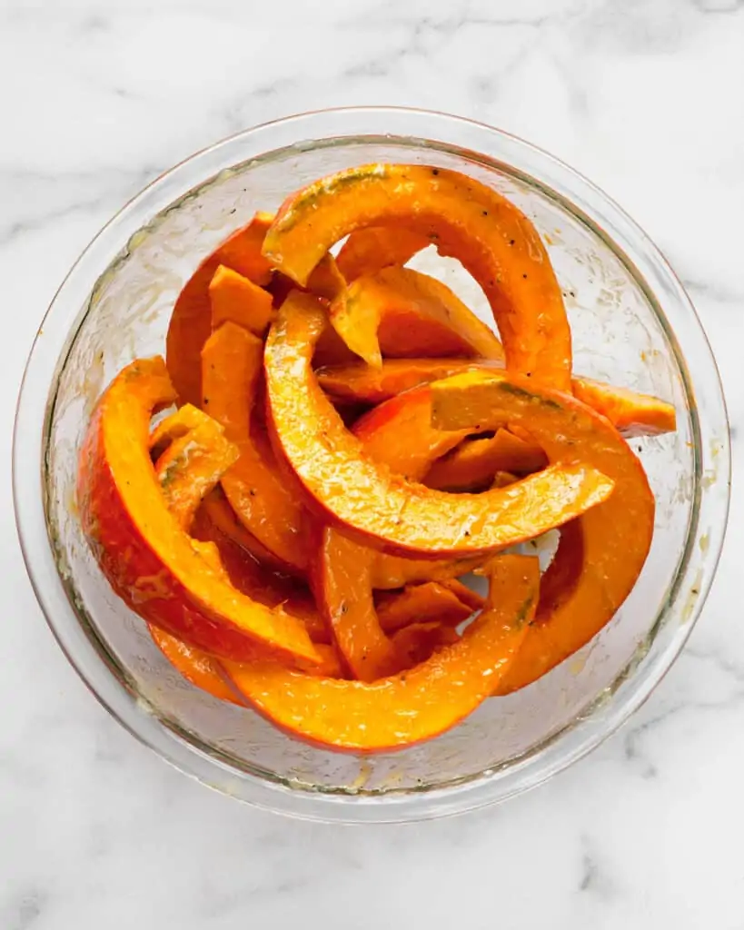Toss squash wedges in bowl with miso marinade