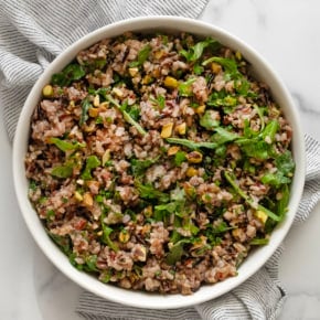 Herby wild rice salad in a bowl.