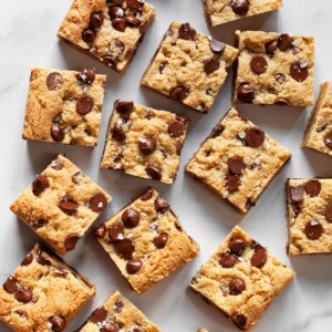 Bar cookies with chocolate chips cut into squares.