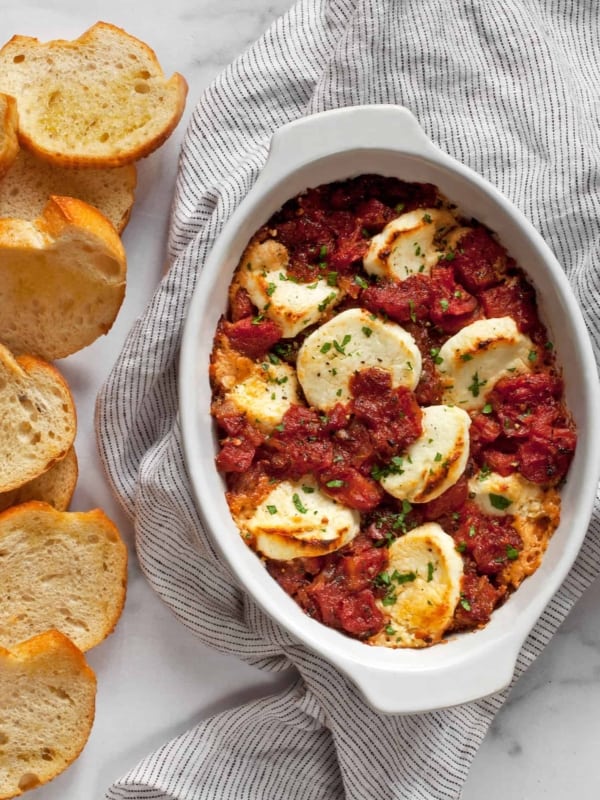 Baked goat cheese appetizer with tomatoes