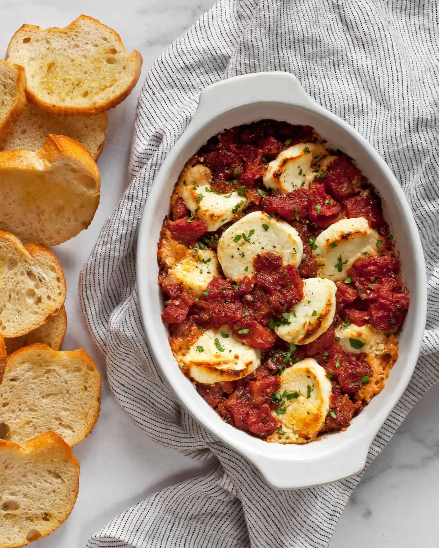 Baked goat cheese appetizer with tomatoes