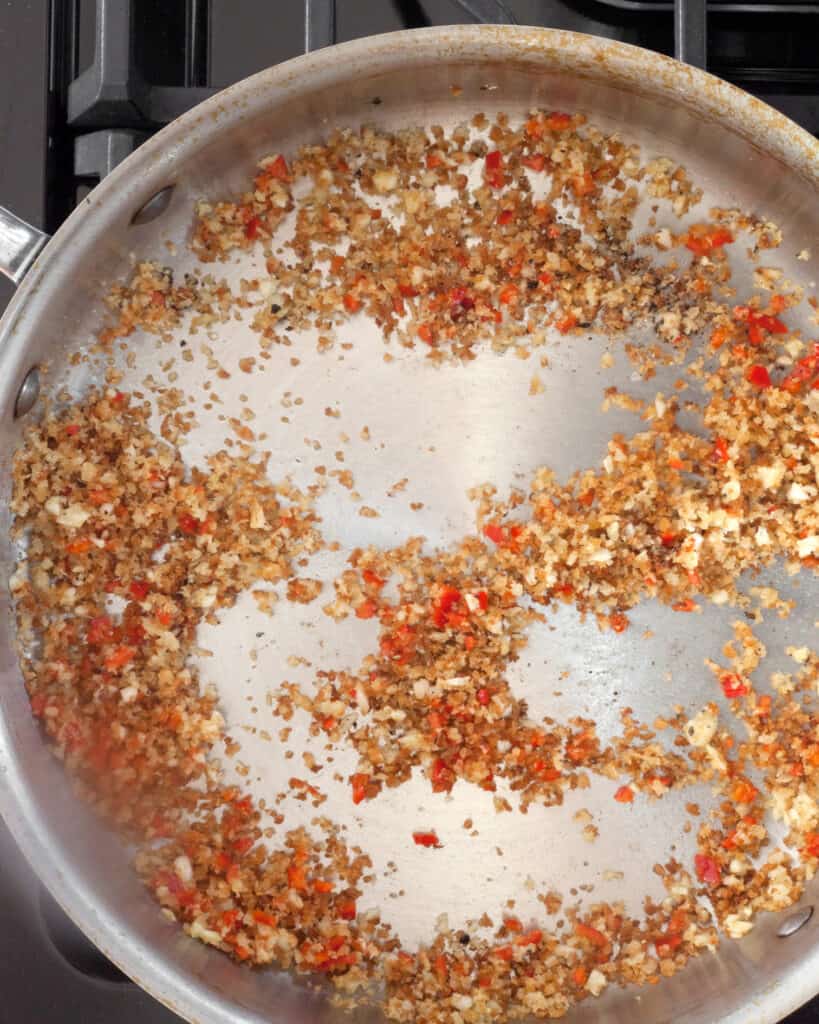 Stir in the garlic and chilies