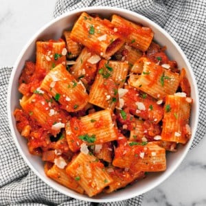 Rigatoni with tomato sauce in a bowl.