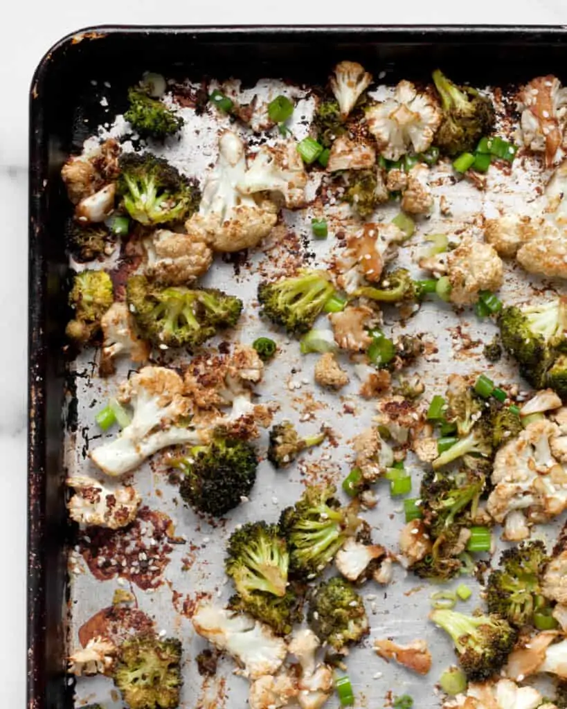 Roasted broccoli and cauliflower on a sheet pan
