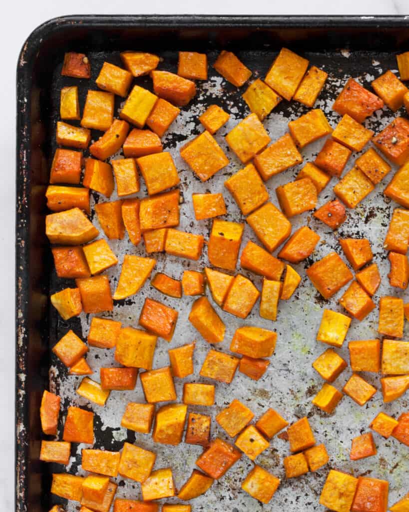 Roasted butternut squash on a sheet pan
