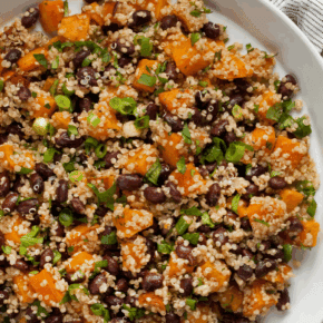 Butternut squash black bean quinoa on a plate.