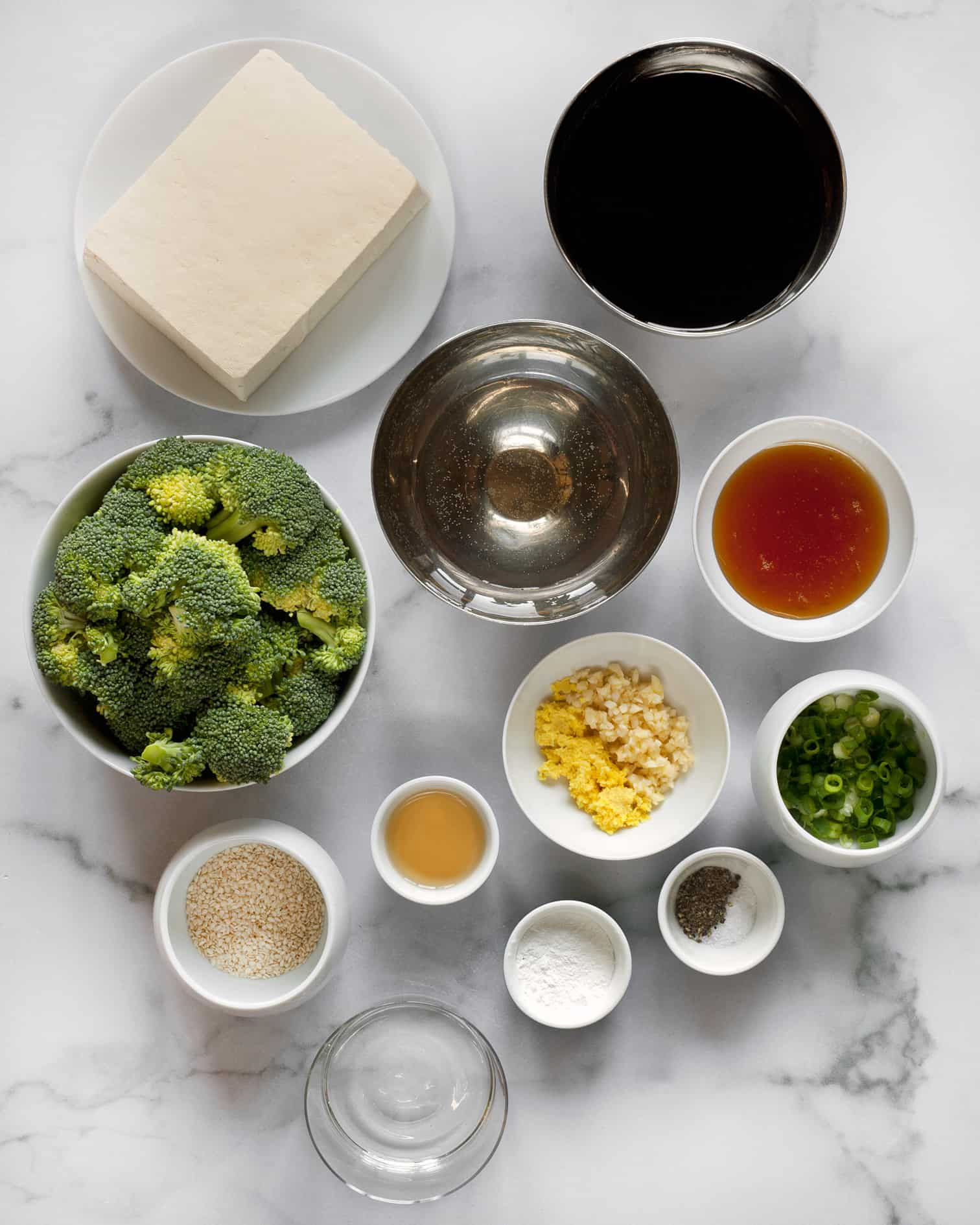 Ingredients including tofu, broccoli, garlic, ginger, soy sauce, honey and scallions